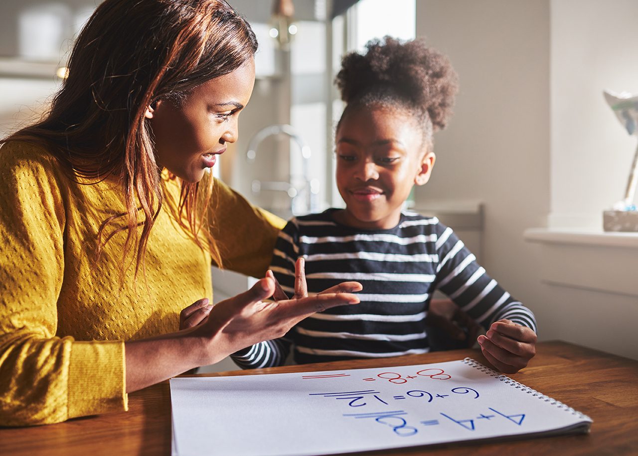 Mother and daughter doing math homework